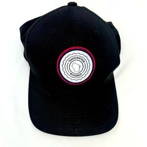 Travis Matthew Wisconsin Black 110 Flexfit SnapBack Ball Cap With Front Patch